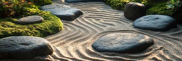 Peaceful zen garden with raked sand patterns and moss-covered stones photo