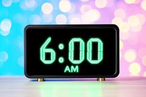 Digital alarm clock glowing at six AM against a futuristic background with soft blue neon lighting photo
