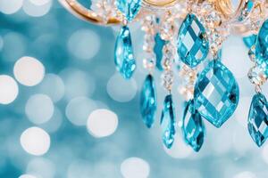Elegant chandelier with turquoise crystals creating a soft glow in a dimly lit room photo