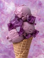 Purple ice cream cone with amethyst crystals photo