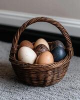 Easter eggs in a wicker basket photo