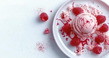 Delicious raspberry ice cream scoop with fresh raspberries and sauce photo