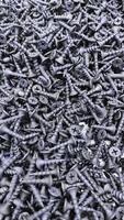 steel self-tapping screws for working with wooden products , self-tapping screws for attaching objects to wooden objects, for repair work, hardware store, construction, carpentry, joinery photo