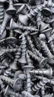 steel self-tapping screws for working with wooden products , self-tapping screws for attaching objects to wooden objects, for repair work, hardware store, construction, carpentry, joinery photo