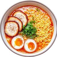 Flat lay of hot and spicy ramen noodles with pork and boiled egg, and green onion in a white bowl isolated on a white background. . photo