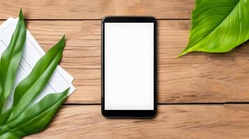 A smartphone with a blank white screen placed on a wooden table, surrounded by office supplies in a minimalistic workspace photo