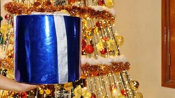Christmas gift with bokeh of twinkling party lights photo