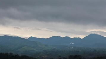 Beautiful view nature mountains clouds grey sky photo