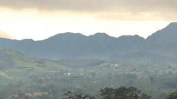 view of beautiful Nature mountains clouds grey sky photo
