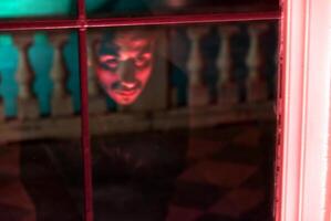 ghostly apparition reflected in a window photo
