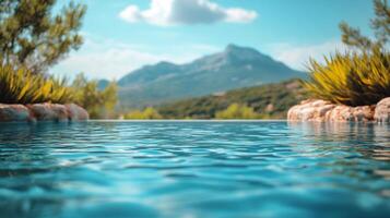 Crystal clear natural spring with lush greenery in a serene landscape during daylight photo