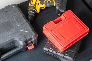 Tool Cases and Drill in a Workshop Setting photo
