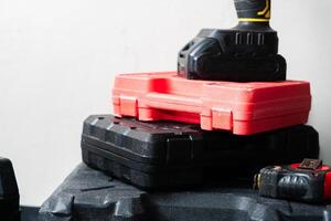 Stack of Tool Cases with Power Drill photo