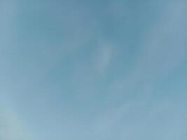 blue sky background with tiny clouds, soft focus, and copy space. Natural beautiful blue sky and white cloud background,At Afternoon. photo