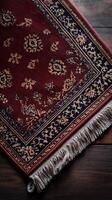 Close up of a traditional red and navy oriental rug photo