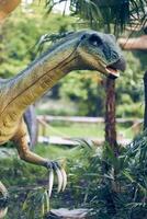 Head close-up Therizinosaurus is a predatory dinosaur species with hypertrophied nails, the strangest dinosaur from the very end of the Cretaceous period. Close-up with copy space photo
