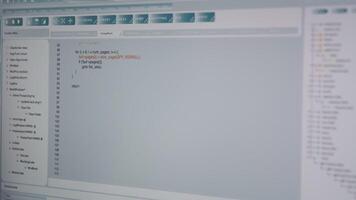Close up of code being typed on PC screen by admin developing software, entering commands. Computer display used by IT professional at home fixing errors in application, implementing new features video