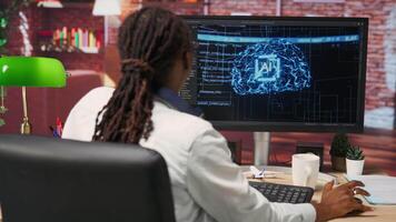 Happy programmer celebrating after successfully implementing code using artificial intelligence computing. Cheerful employee excited after finishing work on AI deep neural networks on PC, camera B video