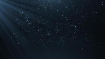 Flying dust on a blue background. 4K motion graphics. snowfall particle overlay, glitter animation video