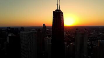 Sunset Behind Chicago Skyline, A stunning view of the Chicago skyline with the sun setting in the background video