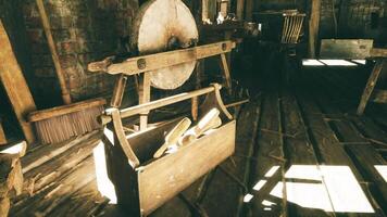 Tools and equipment in a rustic workshop with natural light illuminating space video