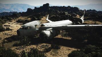 Plane wreckage rests in rocky terrain after a crash in remote area video