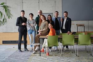 A diverse multiethnic business team engages in a collaborative meeting, discussing strategies and solutions in a modern office setting photo