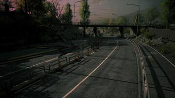 Desolate road near railway tracks in abandoned urban area at dusk video
