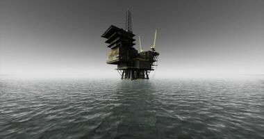 Oil rig standing tall in calm waters at twilight with reflections visible video