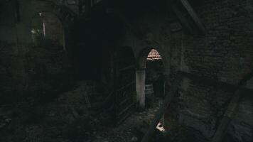 Exploring an abandoned building with crumbling walls and hidden corners video