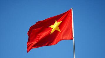 Vietnamese National Flag Fluttering Against A Vibrant Clear Blue Sky photo