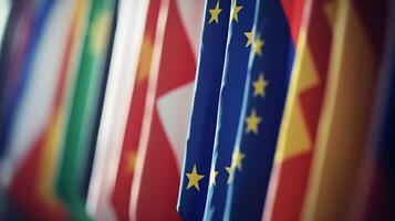 European and International Flags Hanging in Diplomatic Building photo