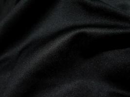 Black and white wave cloth is a beautiful wrinkle texture. luxurious background design photo