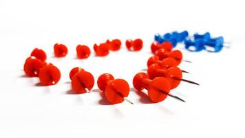 A red pin is stuck in the shape of a heart. photo