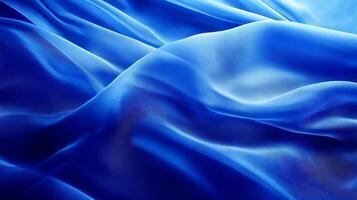 Elegant Blue Satin Fabric Folds with Smooth Texture and Play of Light photo
