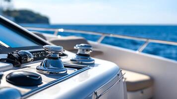 Modern Yacht Deck with Chrome Details and Ocean Backdrop Under Clear Blue Skies photo