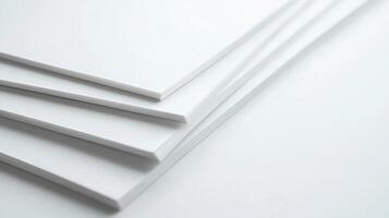 Minimalist Closeup of Smooth White Sheets of Paper Creating a Crisp Clean Abstract Background photo