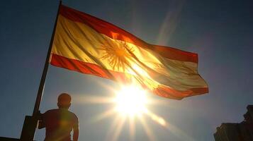Argentinian flag in silhouette against a bright sunlit sky representing national pride photo