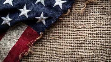 Rustic American Flag on Burlap Texture Background for Patriotic Themes and Events photo