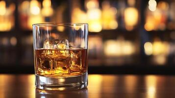 Refreshing Whiskey with Ice Cubes in a Moodily Lit Bar Setting photo