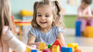 Smiling Child Playing with Colorful Building Blocks in a Preschool Setting photo