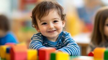 Happy Toddler Playing with Colorful Building Blocks in a Vibrant Classroom Setting photo