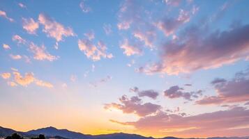 Stunning Sunrise Over Mountain Range with Colorful Sky and Clouds Scenic View photo