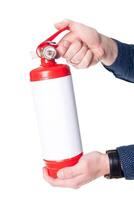 Man using fire extinguisher isolated on white photo
