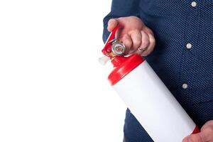 Man using fire extinguisher isolated on white photo
