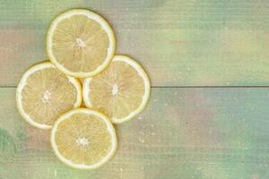 lemon slices on wooden table. creative photo. photo