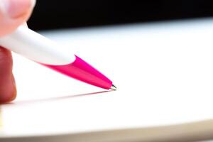 Pen and notebook close up photo