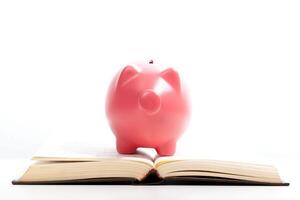 piggy bank on a stack of book concept of education costs photo