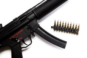 submachine gun MP5 with silencer isolated photo