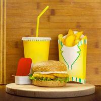 fast food menu with hamburger, french fries and glass of cola photo